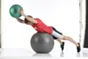 Medizinball 4,0 kg grün Übung Mann